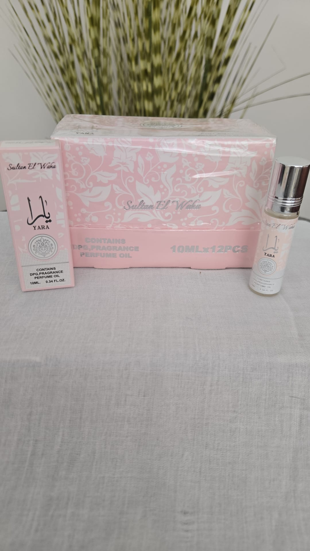 3e le parfum de poche roll Yara existe aussi le même modele le Fakhar de Lattafa